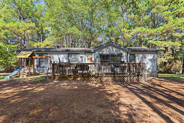 21.8 Acres of Recreational Land with Home for Sale in Marshall, Texas