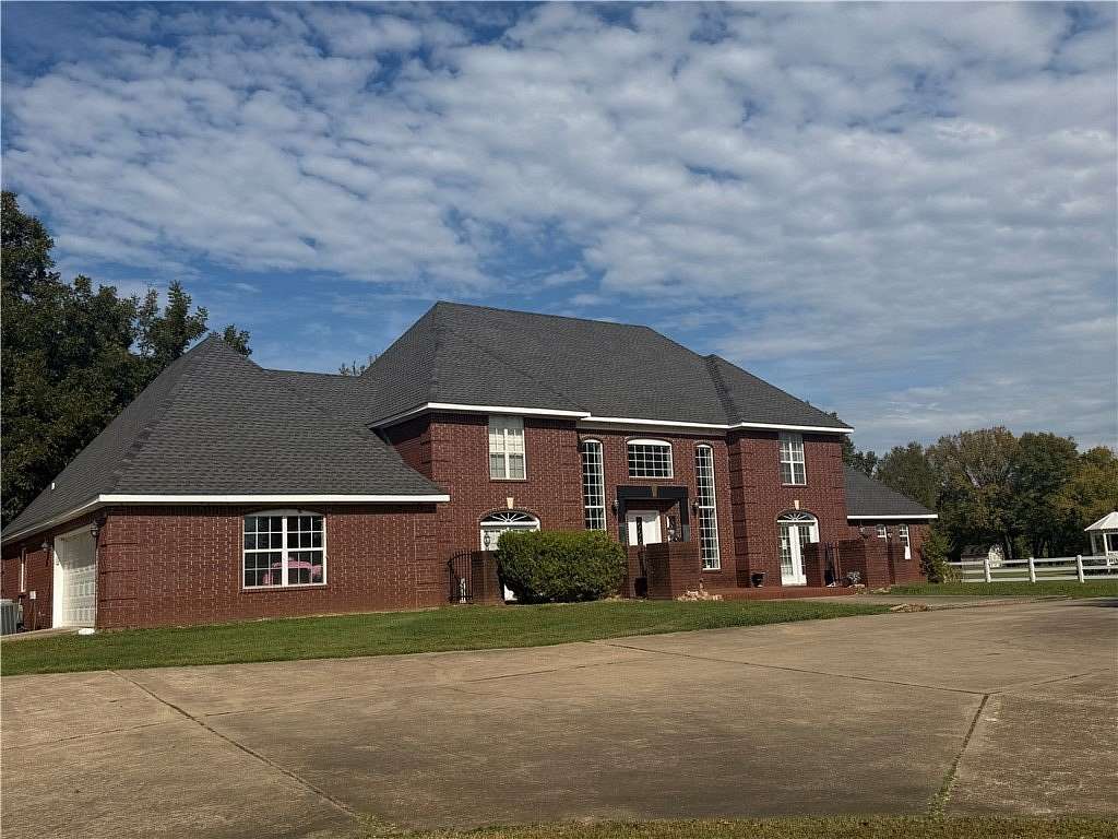 2.55 Acres of Land with Home for Sale in Clarksville, Arkansas