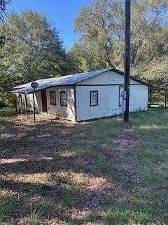 13.6 Acres of Land with Home for Sale in San Augustine, Texas