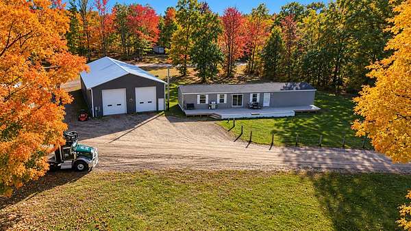 15.7 Acres of Land with Home for Sale in Harrietta, Michigan