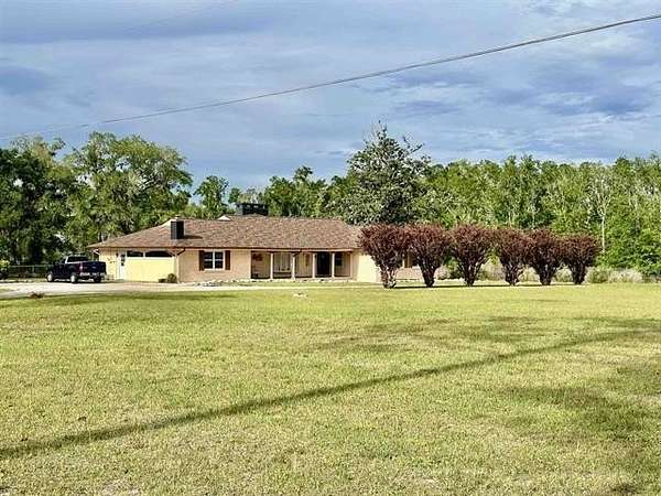 7.23 Acres of Land with Home for Sale in Perry, Florida