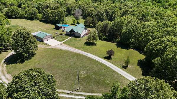 5 Acres of Land with Home for Sale in Hartville, Missouri