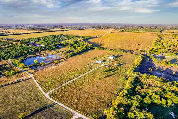 20.6 Acres of Land with Home for Sale in Wolfe City, Texas