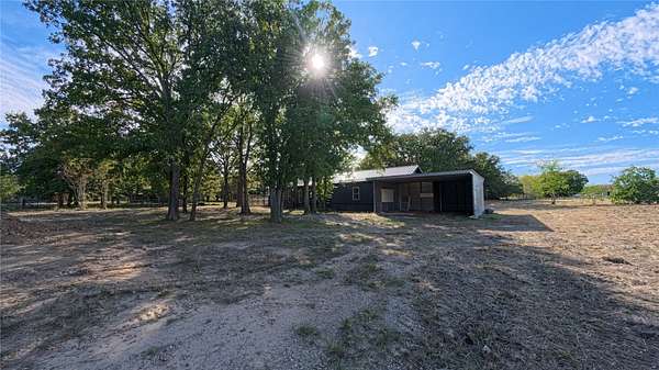 1.61 Acres of Land with Home for Lease in Quinlan, Texas