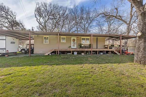 5 Acres of Land with Home for Sale in Denison, Texas