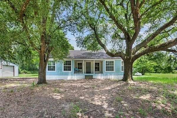 6.23 Acres of Land with Home for Sale in Groveton, Texas