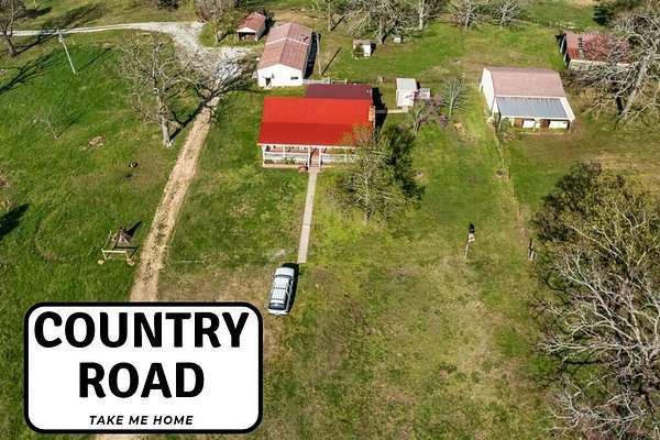 5.73 Acres of Land with Home for Sale in Walnut Shade, Missouri