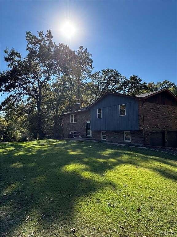 5.68 Acres of Land with Home for Sale in Worden, Illinois