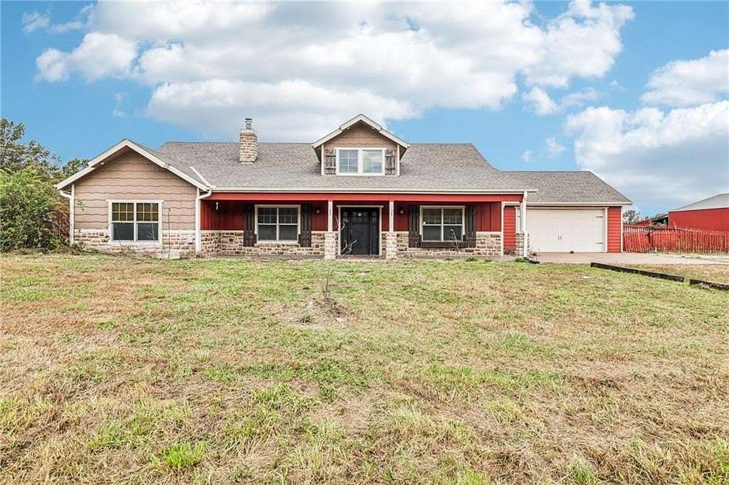 7.57 Acres of Land with Home for Sale in Harrisonville, Missouri