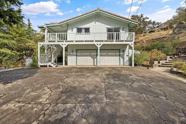 6.12 Acres of Land with Home for Sale in Squaw Valley, California