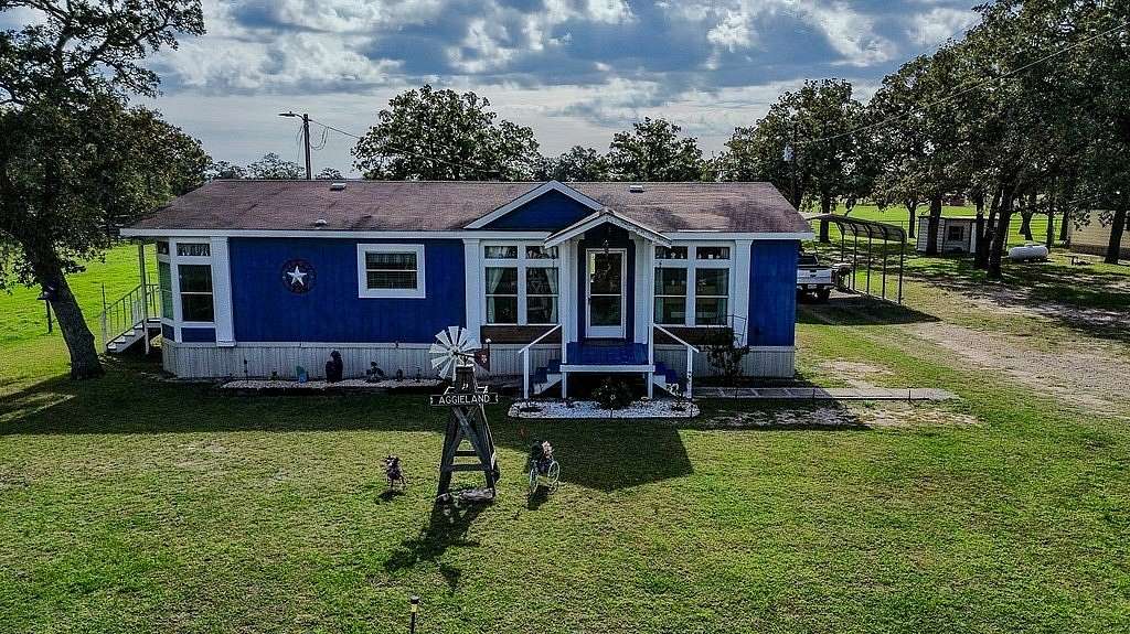 9.28 Acres of Land with Home for Sale in Ledbetter, Texas
