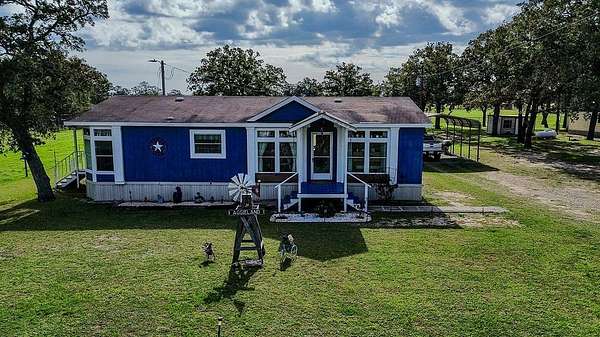 9.28 Acres of Land with Home for Sale in Ledbetter, Texas