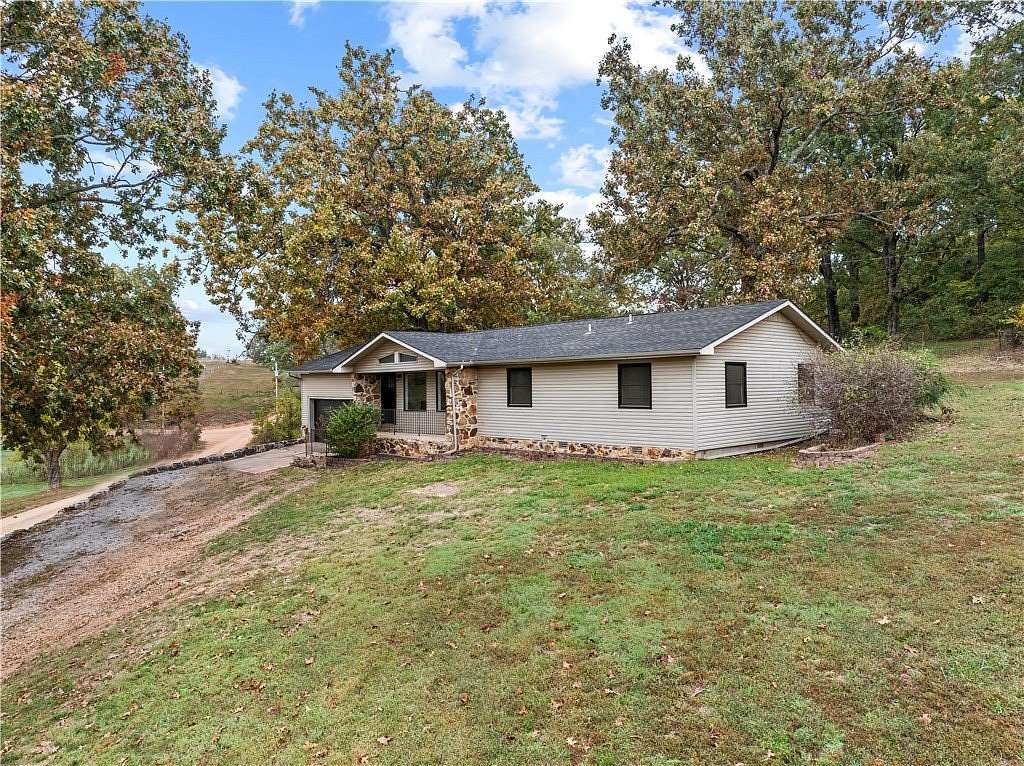 1.66 Acres of Land with Home for Sale in Harrison, Arkansas