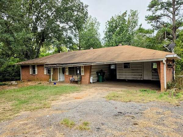3.79 Acres of Land with Home for Sale in Palestine, Texas