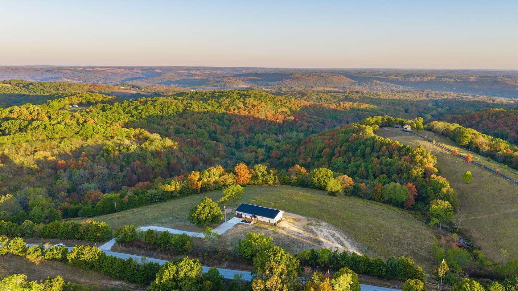 5 Acres of Land with Home for Sale in Cape Fair, Missouri