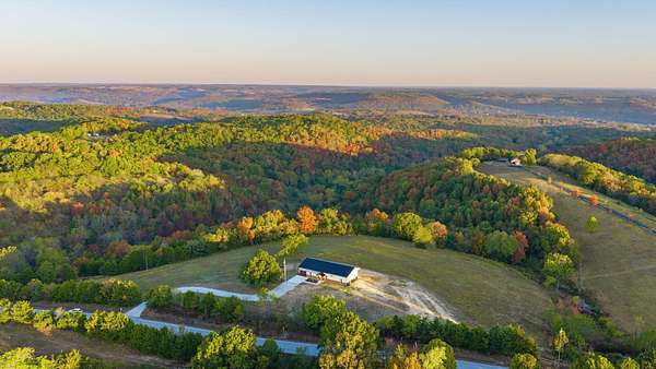 5 Acres of Land with Home for Sale in Cape Fair, Missouri