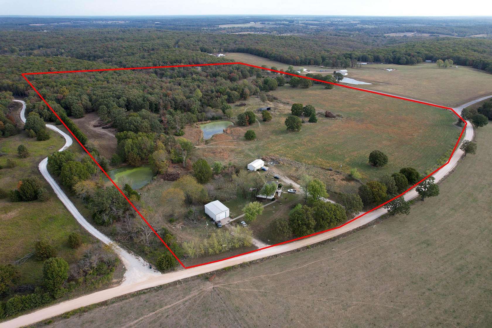 42.9 Acres of Land with Home for Sale in Long Lane, Missouri