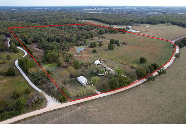 42.9 Acres of Land with Home for Sale in Long Lane, Missouri