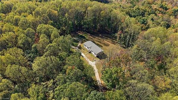39.7 Acres of Recreational Land with Home for Sale in Pilot Mountain, North Carolina