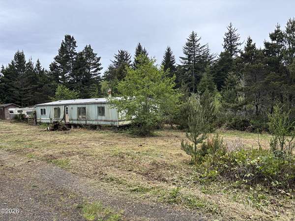 3.5 Acres of Land with Home for Sale in Seal Rock, Oregon