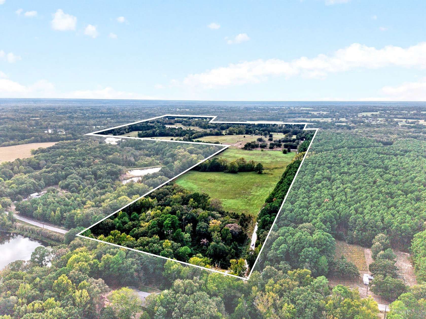 190 Acres of Recreational Land with Home for Sale in Quitman, Texas