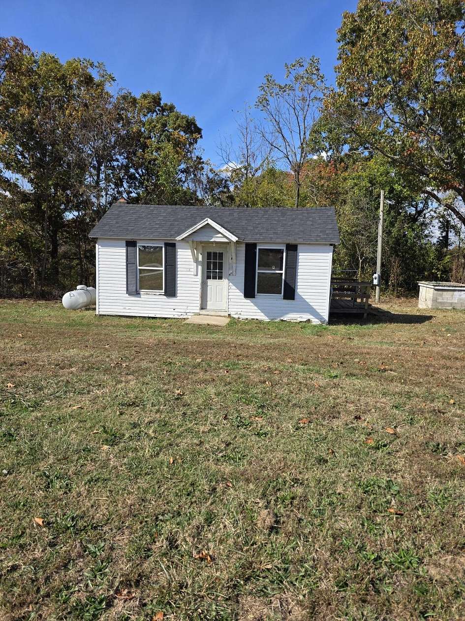 0.73 Acres of Land with Home for Sale in Mansfield, Missouri