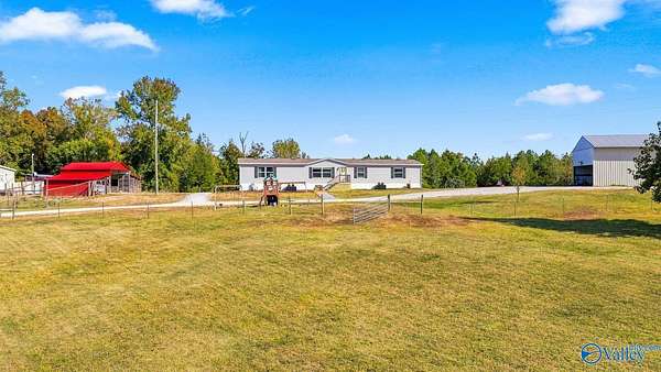 10.6 Acres of Land with Home for Sale in Tuscumbia, Alabama