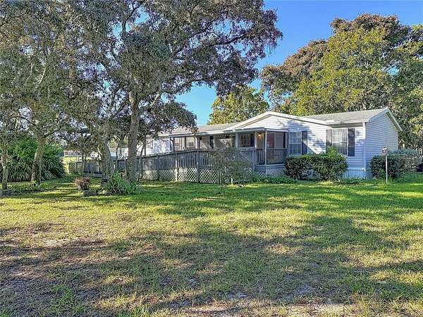 2.75 Acres of Land with Home for Sale in Spring Hill, Florida