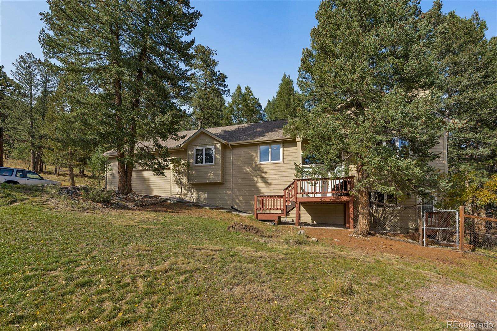 1.87 Acres of Land with Home for Sale in Evergreen, Colorado