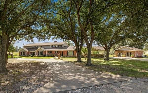 1.72 Acres of Land with Home for Sale in Madisonville, Texas