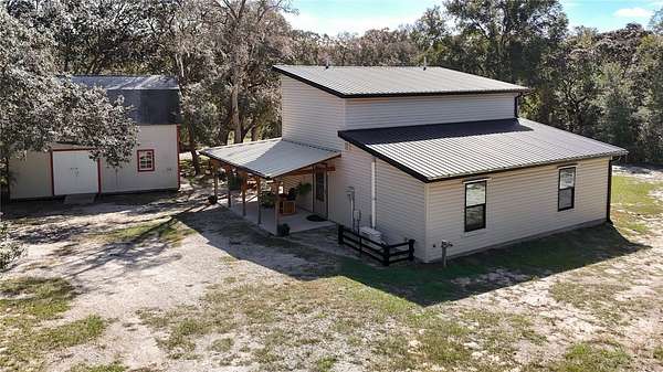 2.5 Acres of Land with Home for Sale in Spring Hill, Florida