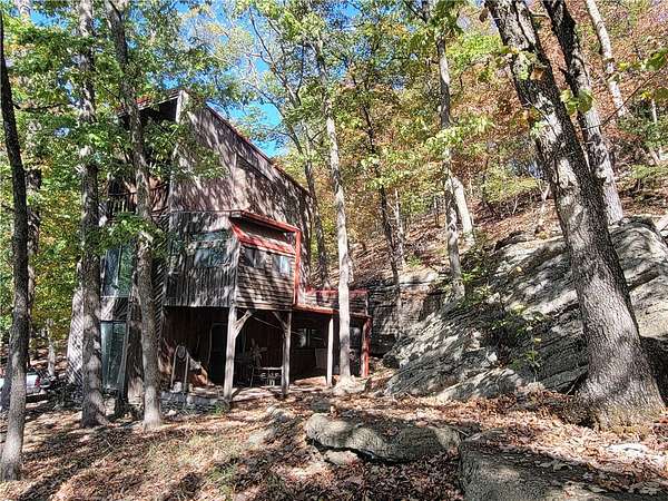 5 Acres of Land with Home for Sale in Holiday Island, Arkansas