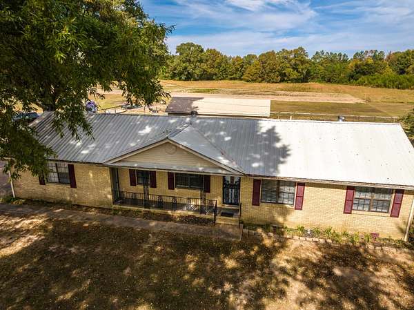 5.4 Acres of Land with Home for Sale in Whiteville, Tennessee