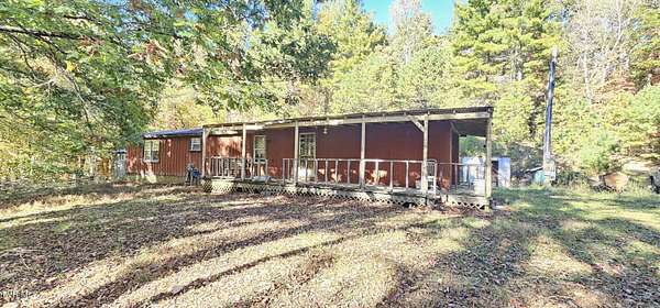 5.23 Acres of Land with Home for Sale in Mountain City, Tennessee