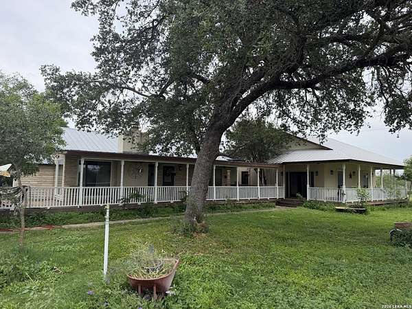 120 Acres of Land with Home for Sale in Devine, Texas