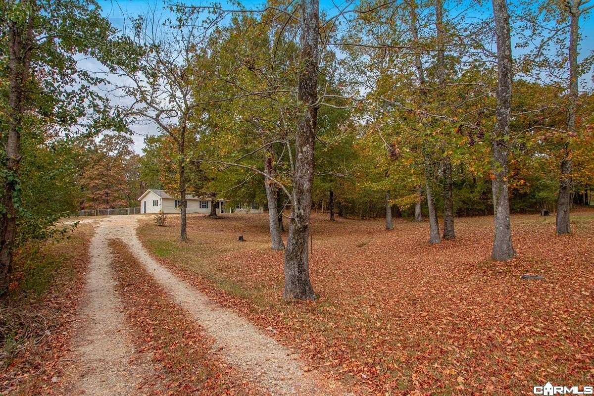 1.5 Acres of Land with Home for Sale in Benton, Arkansas