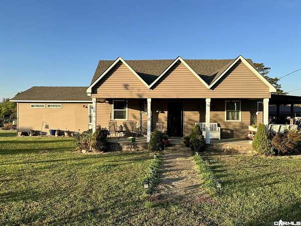 8.4 Acres of Land with Home for Sale in Locust Grove, Arkansas