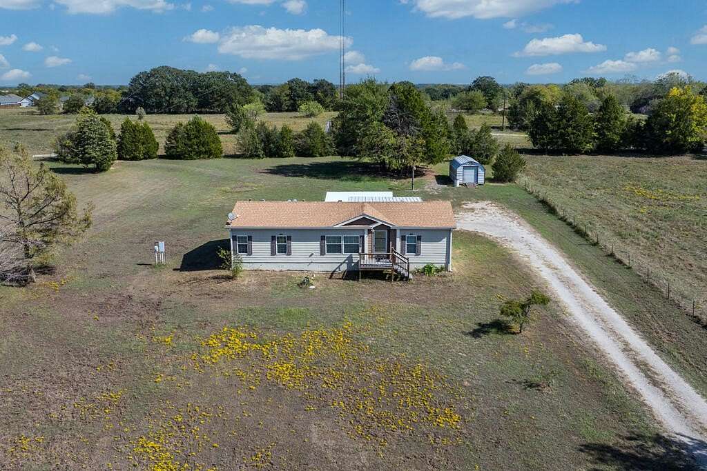 1.5 Acres of Land with Home for Sale in Gun Barrel City, Texas