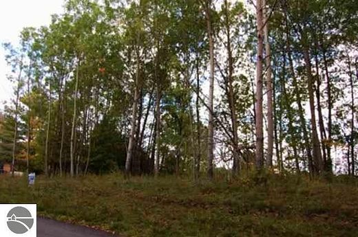0.78 Acres of Residential Land for Sale in Kewadin, Michigan