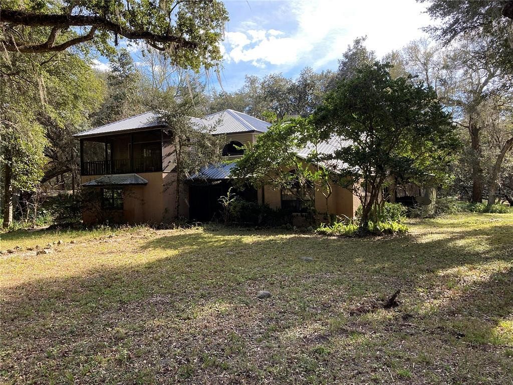 78 Acres of Agricultural Land with Home for Sale in Lake Panasoffkee, Florida