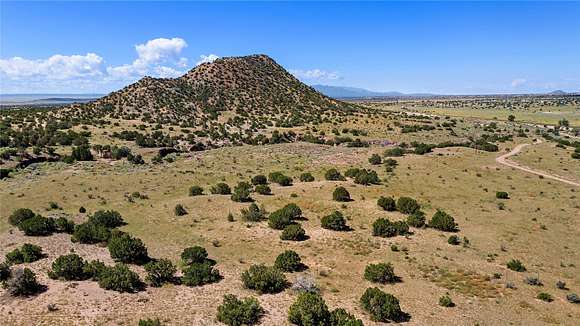 2,223 Acres of Agricultural Land with Home for Sale in Lamy, New Mexico