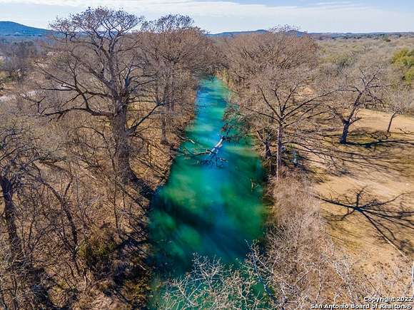 99.41 Acres of Agricultural Land with Home for Sale in Center Point, Texas