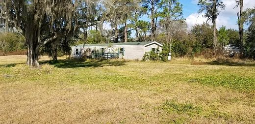 10.2 Acres of Land with Home for Sale in Auburndale, Florida