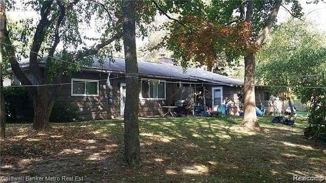 5 Acres of Land with Home for Sale in Waterford, Michigan