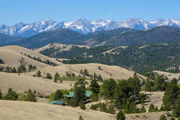 154 Acres of Recreational Land with Home for Sale in Cotopaxi, Colorado
