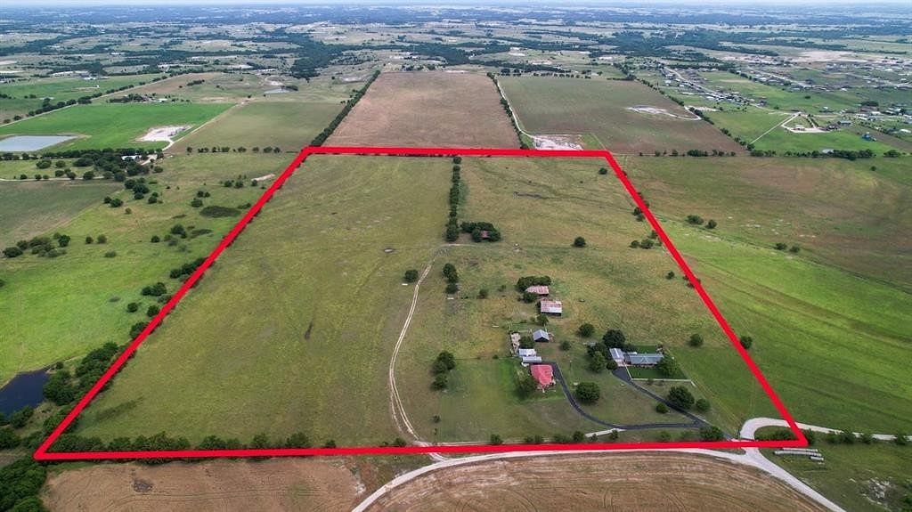 74 Acres of Agricultural Land with Home for Sale in Decatur, Texas