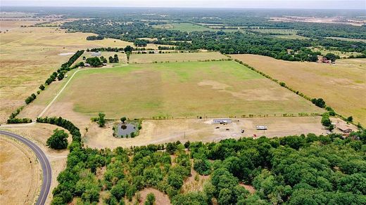 69.3 Acres of Agricultural Land with Home for Sale in Bonham, Texas
