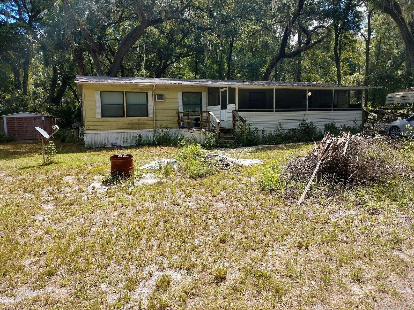 10.3 Acres of Land with Home for Sale in Citra, Florida