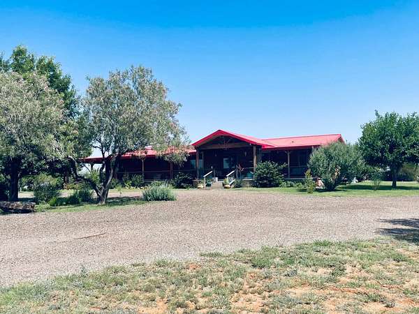 23 Acres of Agricultural Land with Home for Sale in Logan, New Mexico