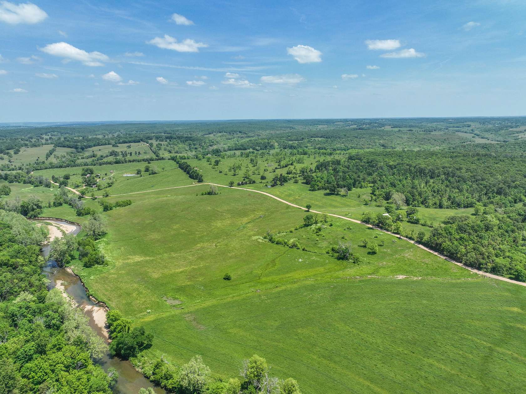 353 Acres of Improved Agricultural Land for Sale in Mountain Grove, Missouri
